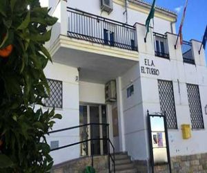 El Turro denuncia la "actitud negligente" de la Junta en los traslados para un cribado masivo